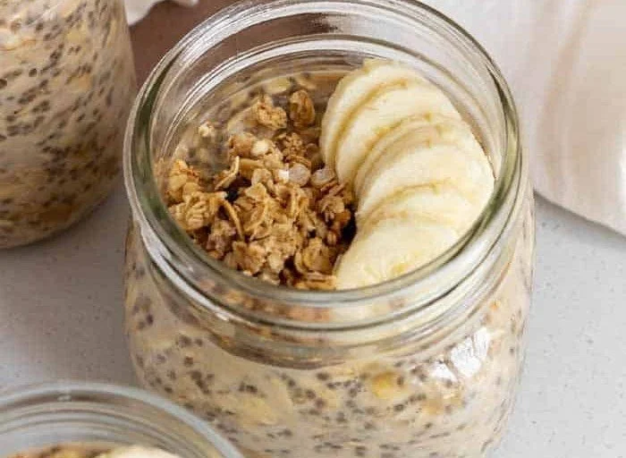 Bowl of brown sugar overnight oats topped with fruits and nuts