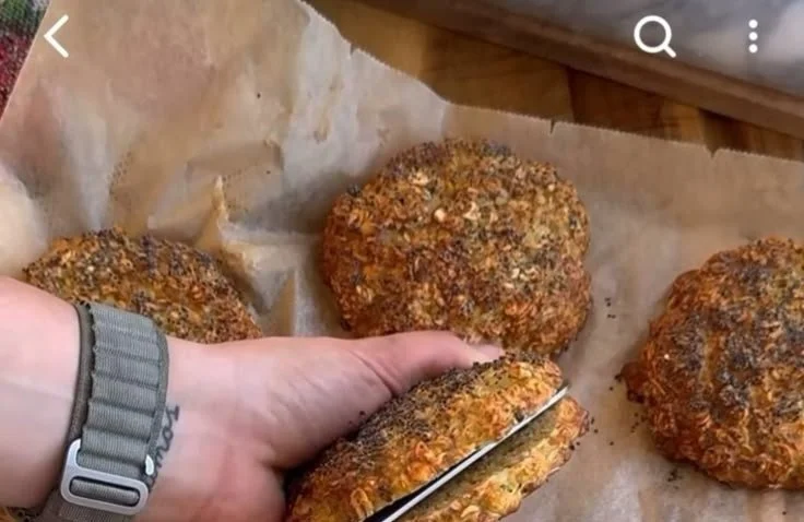 A delicious cottage cheese oat bake served in a dish, topped with fruits and nuts.