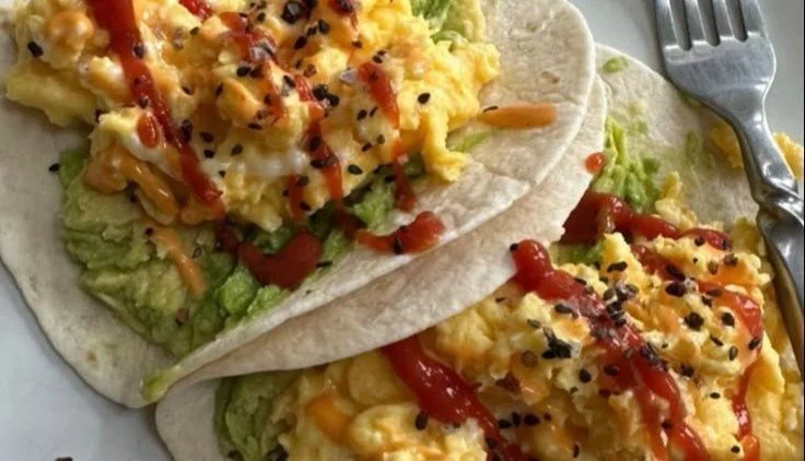 Healthy quinoa and chickpea salad served in a bowl with fresh vegetables