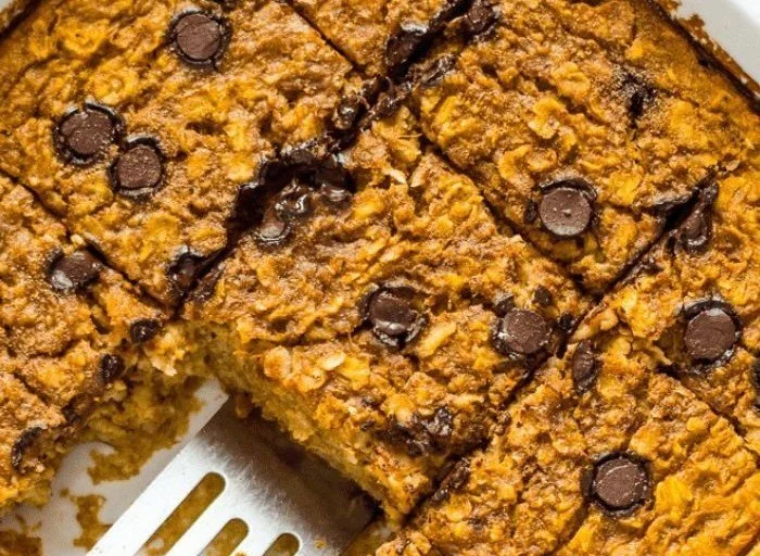 Delicious pumpkin baked oatmeal served in a bowl with toppings.