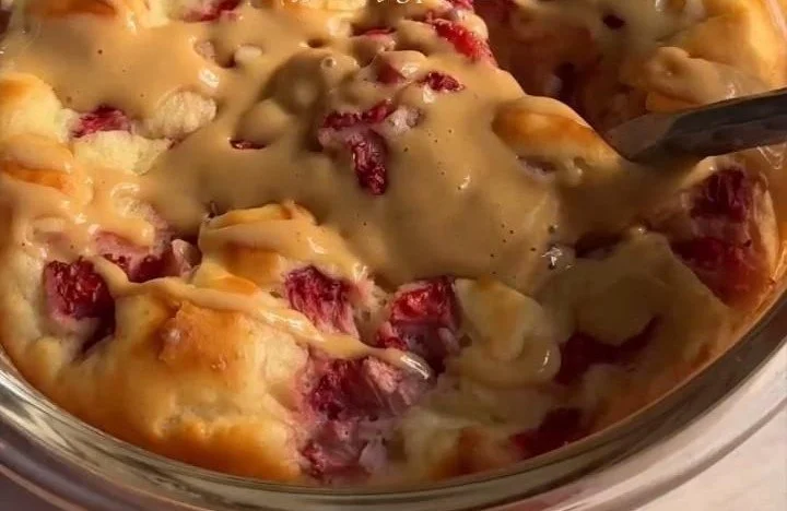 Fluffy single serving baked protein pancake bowl topped with fresh fruits and syrup.