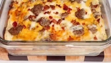 Delicious breakfast pizza casserole with eggs, cheese, and toppings