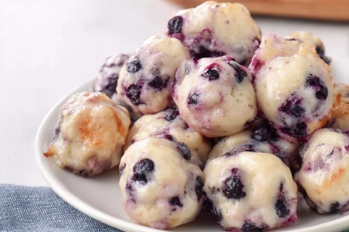 Healthy baked blueberry Greek yogurt fritters on a plate