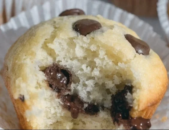 Healthy homemade protein muffins stacked on a plate